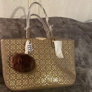 Henri Bendel West 57th E/W laser cut tote